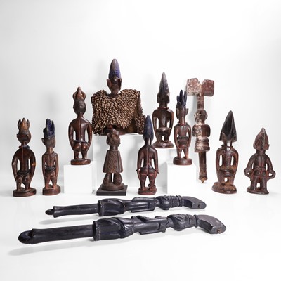 Lot 175 - A collection of ten African carved wood figures