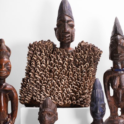 Lot 175 - A collection of ten African carved wood figures