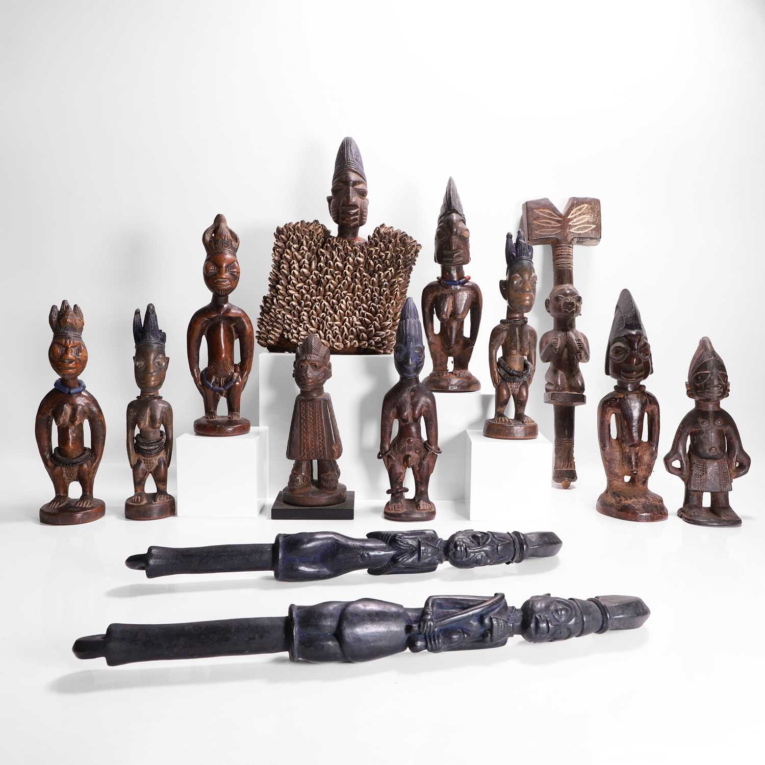 Lot 175 - A collection of ten African carved wood figures