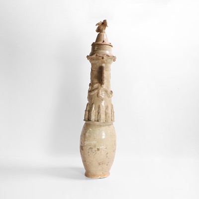 Lot 271 - A qingbai-glazed funerary jar and cover