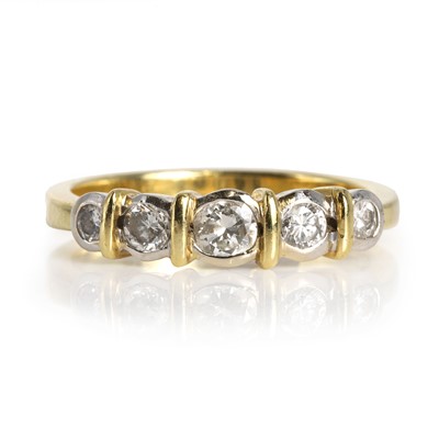 Lot 87 - An 18ct two colour gold five stone diamond ring