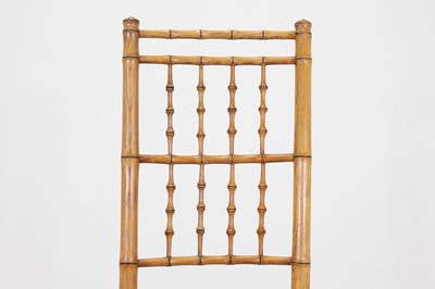 Lot 85 - An ash faux bamboo rocking chair