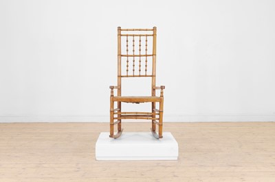 Lot 85 - An ash faux bamboo rocking chair