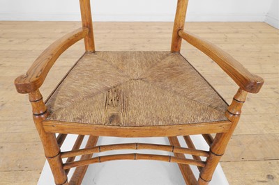 Lot 85 - An ash faux bamboo rocking chair