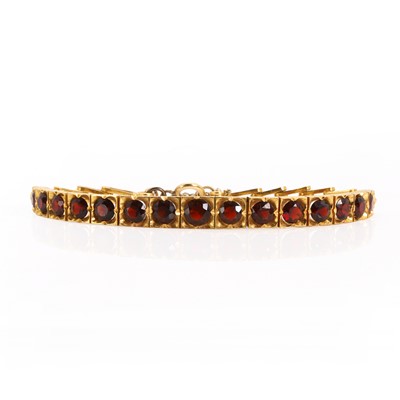 Lot 108 - A garnet set line bracelet