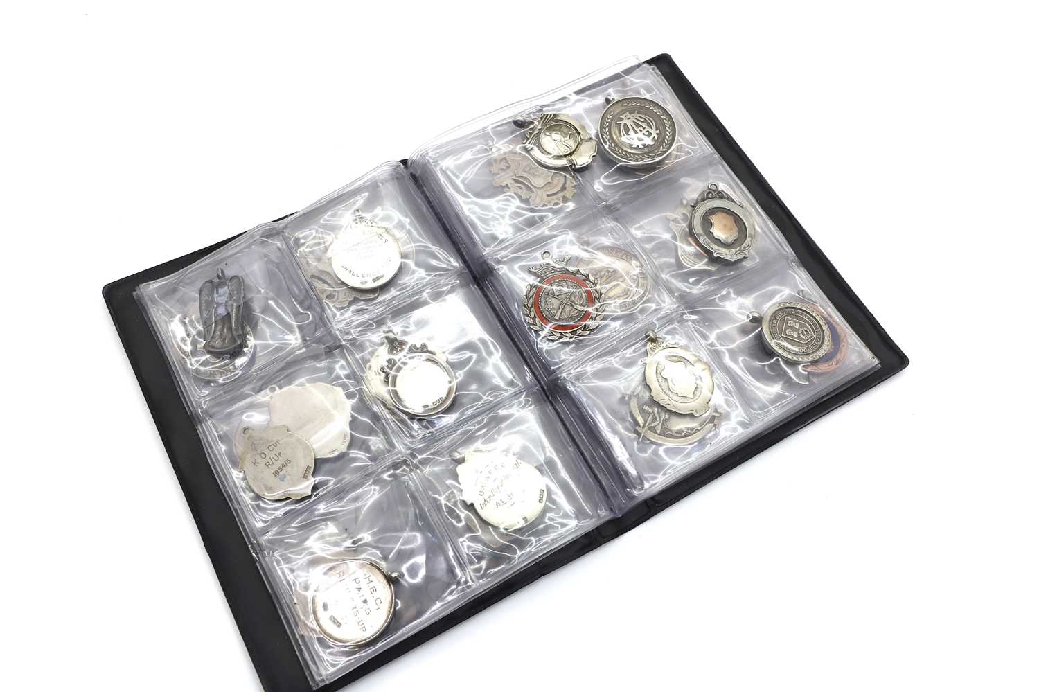 Lot 35 - Seven albums of silver medals