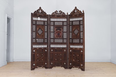 Lot 496 - A carved and inlaid wooden screen