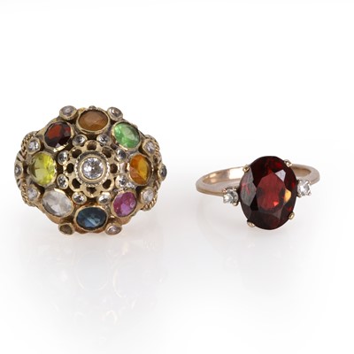 Lot 316 - A Thai princess ring and a garnet ring