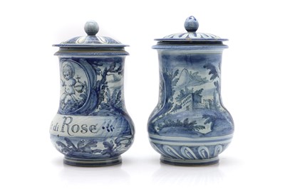 Lot 81 - A near pair of Italian maiolica pottery albarelli