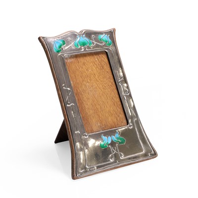 Lot 163 - An Art Nouveau enamelled silver photograph frame