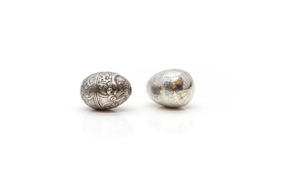 Lot 32 - A pair of white metal nutmeg graters