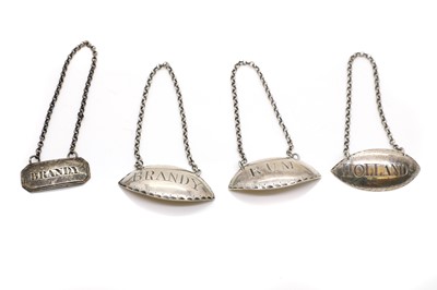 Lot 58 - A group of three George III silver decanter labels