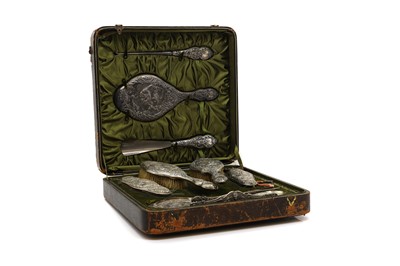 Lot 29 - A cased silver dressing table set