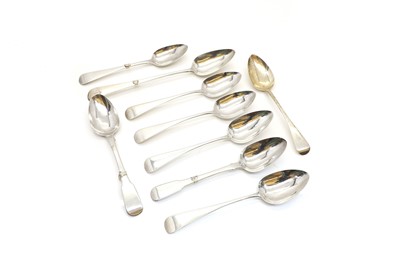 Lot 77 - A group of George III and IV silver serving spoons