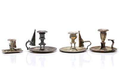 Lot 88 - A group of four silver plated chambersticks