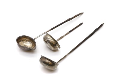 Lot 91 - Three silver toddy ladles