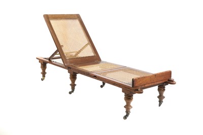 Lot 427 - A Victorian walnut Ilkley couch in the campaign style