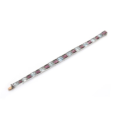 Lot 86 - An aquamarine and ruby line bracelet, c.1950