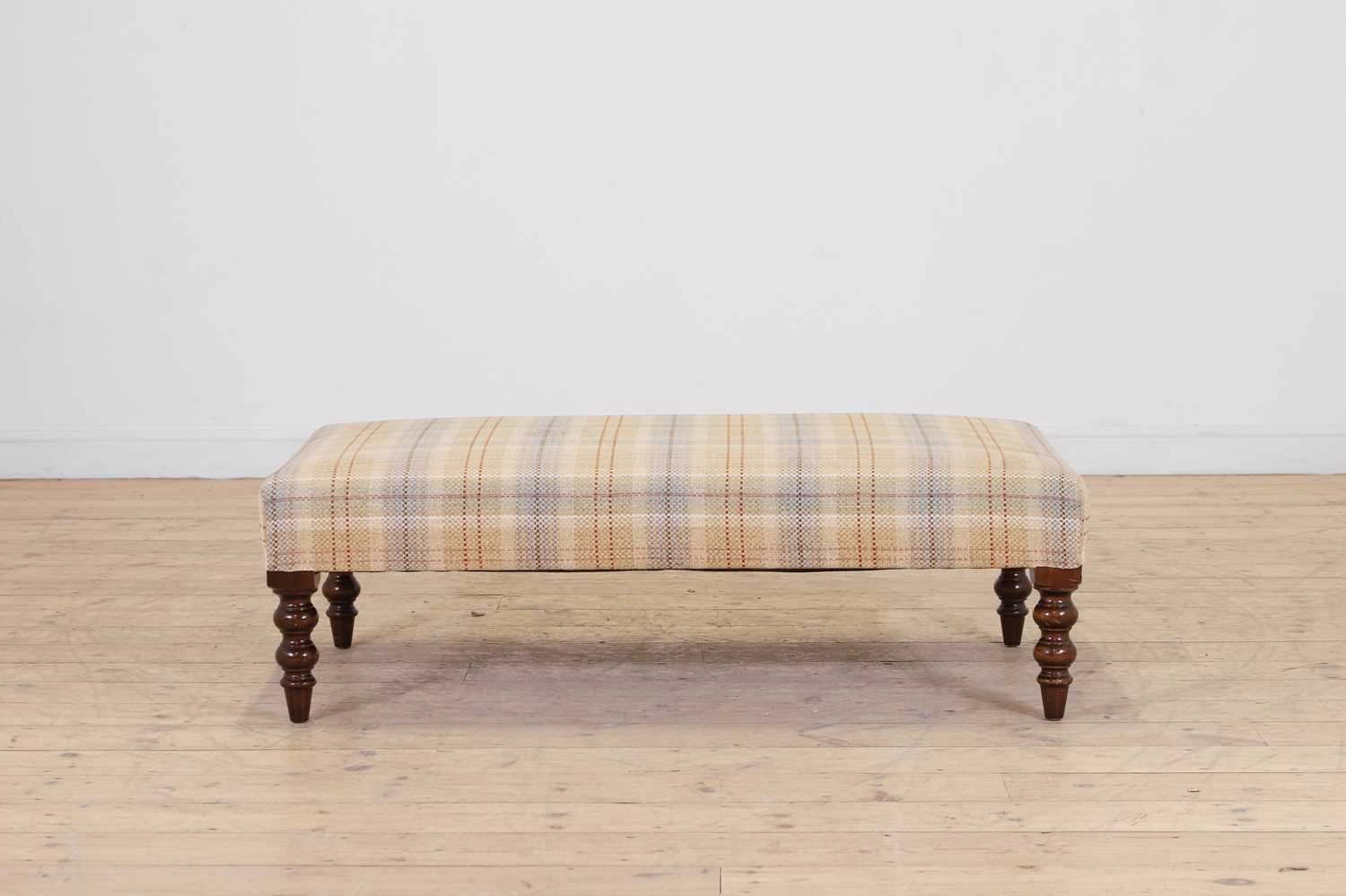 Lot 62 - An upholstered footstool by George Smith