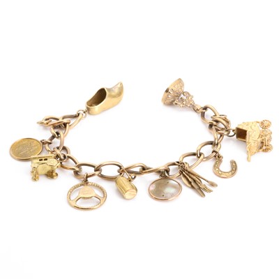 Lot 442 - A 9ct gold charm bracelet
