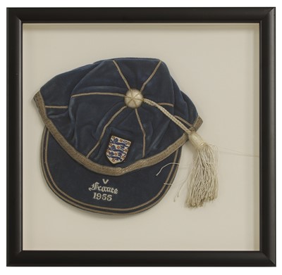 Lot 405 - A framed England football player’s cap