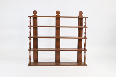 Lot 466 - A six tier open wall hanging shelf