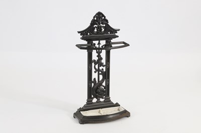 Lot 471 - A cast iron umbrella stand