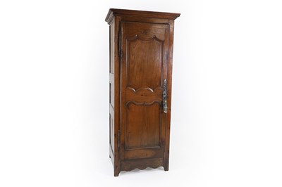 Lot 665 - A fruitwood armoire