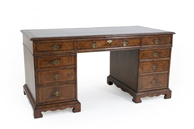 Lot 480 - A walnut and inlaid partner's desk