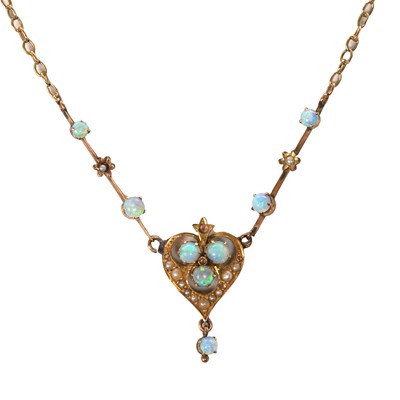 Lot 23 - An Edwardian opal and split pearl necklace