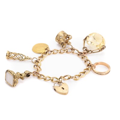 Lot 446 - A 9ct gold charm bracelet