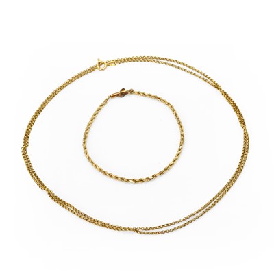 Lot 251 - A gold chain and bracelet