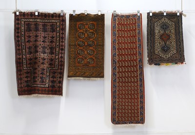 Lot 288 - A group of five small rugs