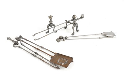 Lot 731 - A set of steel 'Eagle Claw and Ball' fireirons