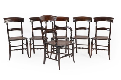 Lot 707 - A set of six beech and cane chairs