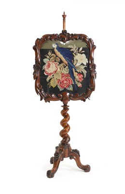 Lot 461 - A Victorian carved walnut pole screen