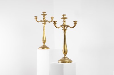 Lot 211 - A pair of Charles X ormolu candelabra