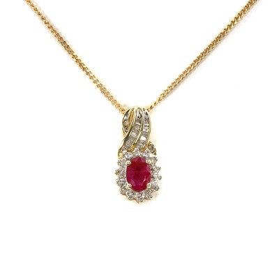 Lot 96 - A ruby and diamond cluster pendant