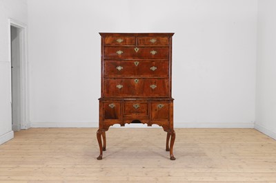 Lot 592 - A George II walnut chest on stand