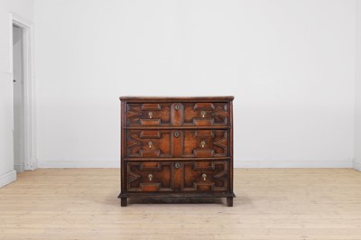 Lot 690 - An oak chest of drawers