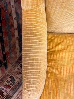 Lot 426 - A pair of upholstered armchairs in the style of Howard & Sons