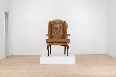 Lot 713 - A George I walnut wingback armchair