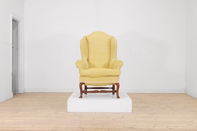 Lot 715 - A beech wing armchair