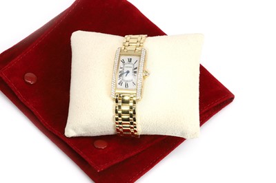 Lot 362 - An 18ct gold and diamond Cartier Tank Americaine ladies' bracelet watch