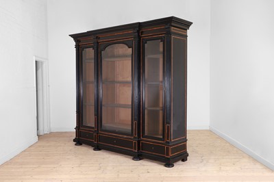 Lot 566 - An ebonised oak bookcase