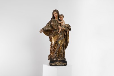 Lot 439 - A carved and polychrome-painted wood figure