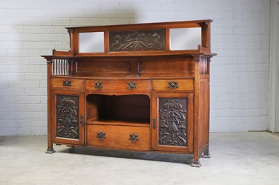 Lot 727 - An Arts and Crafts oak sideboard
