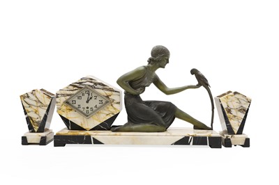 Lot 243 - An Art Deco spelter and marble timepiece