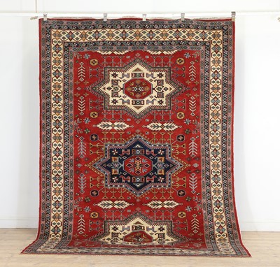 Lot 422 - A Kazak wool rug