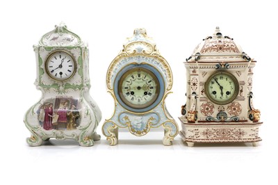 Lot 125 - Three pottery clocks